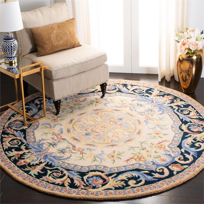Safavieh Savonnerie 6' Round Hand Tufted Wool Rug in Ivory and Black