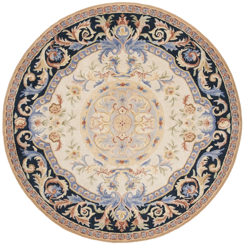 Safavieh Savonnerie 6' Round Hand Tufted Wool Rug in Ivory and Black