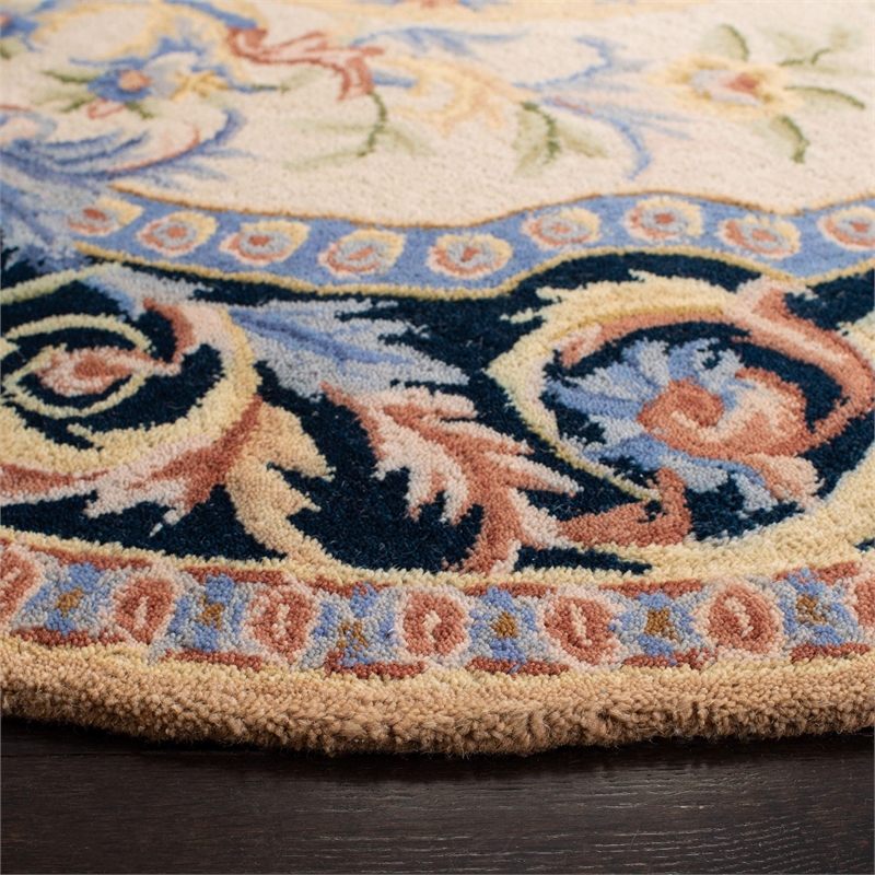 Safavieh Savonnerie 6' Round Hand Tufted Wool Rug in Ivory and Black