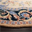 Safavieh Savonnerie 6' Round Hand Tufted Wool Rug in Ivory and Black