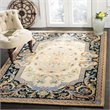 Safavieh Savonnerie 9' x 12' Hand Tufted Wool Rug in Ivory and Black
