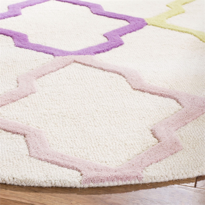 Safavieh 5' Round Hand Tufted Wool Rug in Ivory