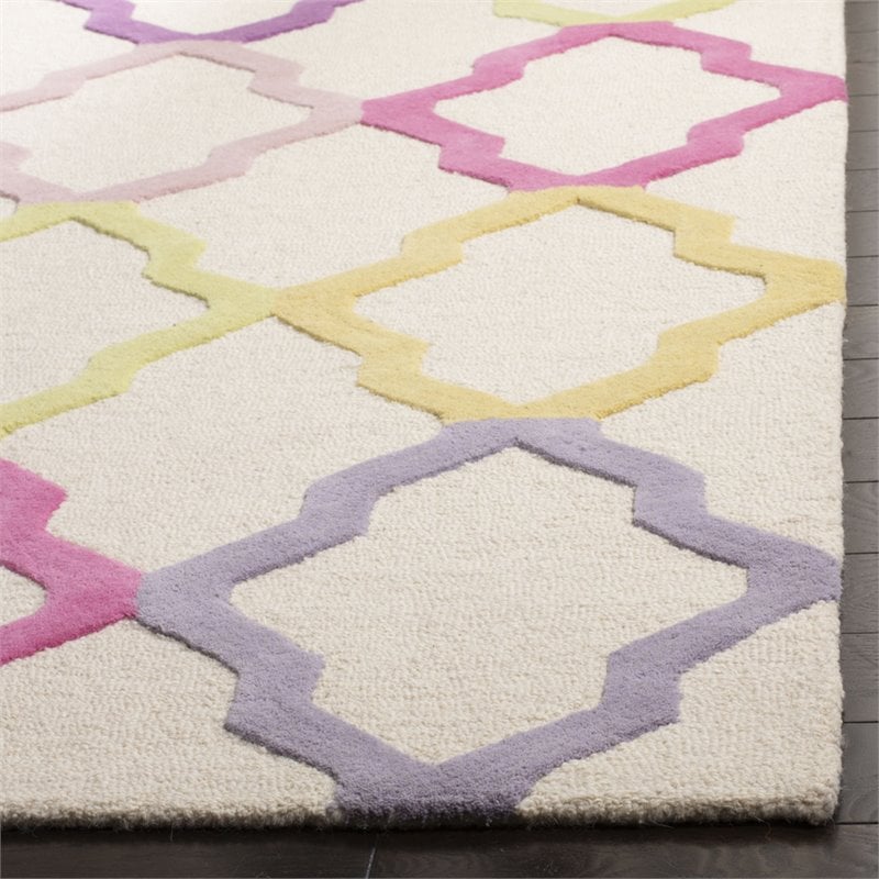 Safavieh 6' x 9' Hand Tufted Wool Rug in Ivory