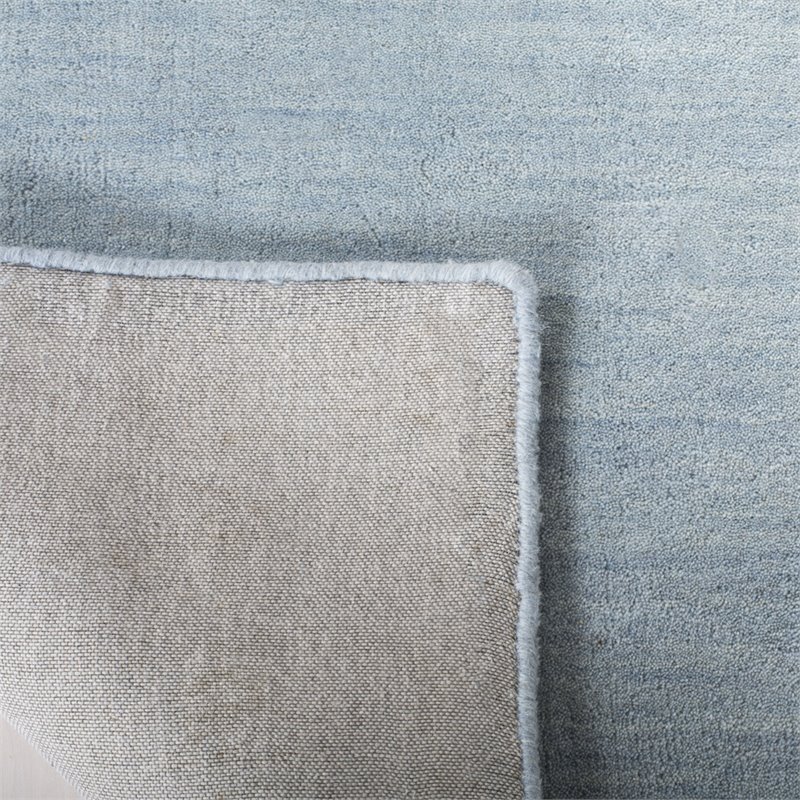 Safavieh 5' x 8' Hand Loomed Wool Rug in Blue and Ivory