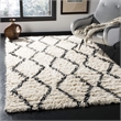 Safavieh Kenya 6' x 9' Hand Woven Shag Wool Rug in Black and Ivory