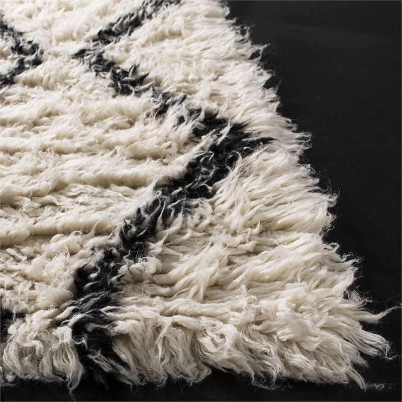 Safavieh Kenya 8' x 10' Hand Woven Shag Wool Rug in Black and Ivory
