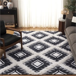 Safavieh Kenya 6' x 9' Hand Woven Shag Wool Rug in Black and Ivory