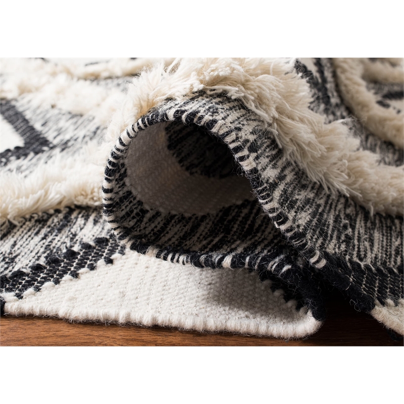 Safavieh Kenya 6' x 9' Hand Woven Shag Wool Rug in Black and Ivory