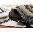 Safavieh Kenya 6' x 9' Hand Woven Shag Wool Rug in Black and Ivory
