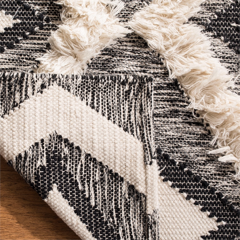 Safavieh Kenya 6' x 9' Hand Woven Shag Wool Rug in Black and Ivory