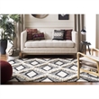 Safavieh Kenya 8' x 10' Hand Woven Shag Wool Rug in Black and Ivory