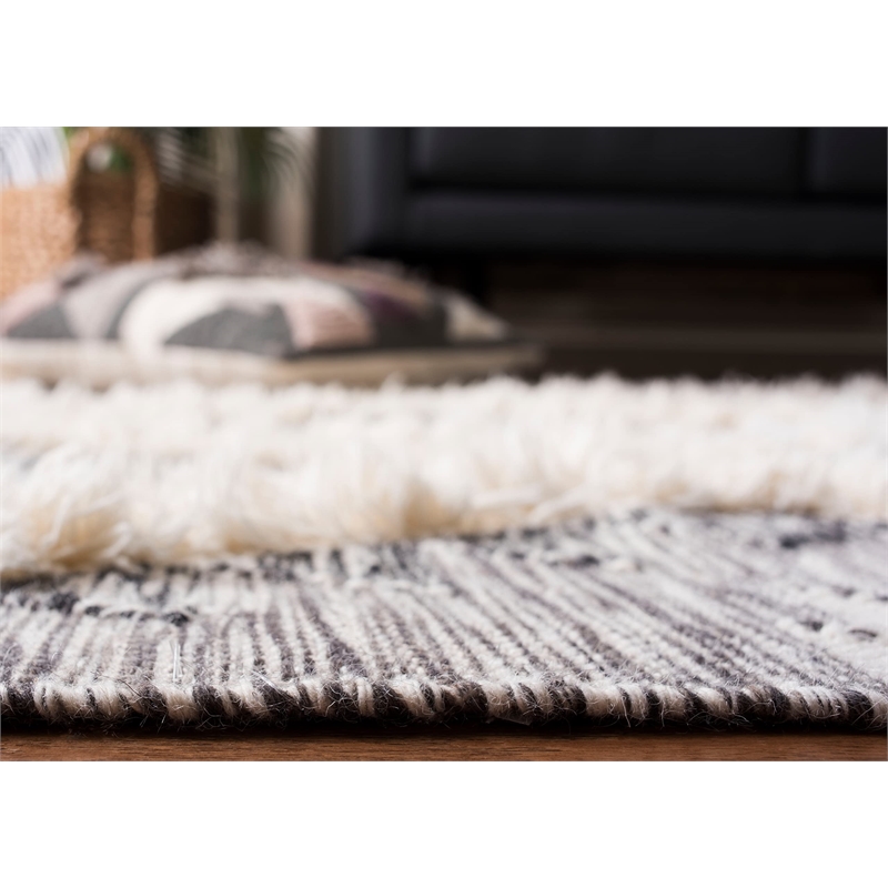 Safavieh Kenya 6' x 9' Hand Woven Shag Wool Rug in Black and Ivory