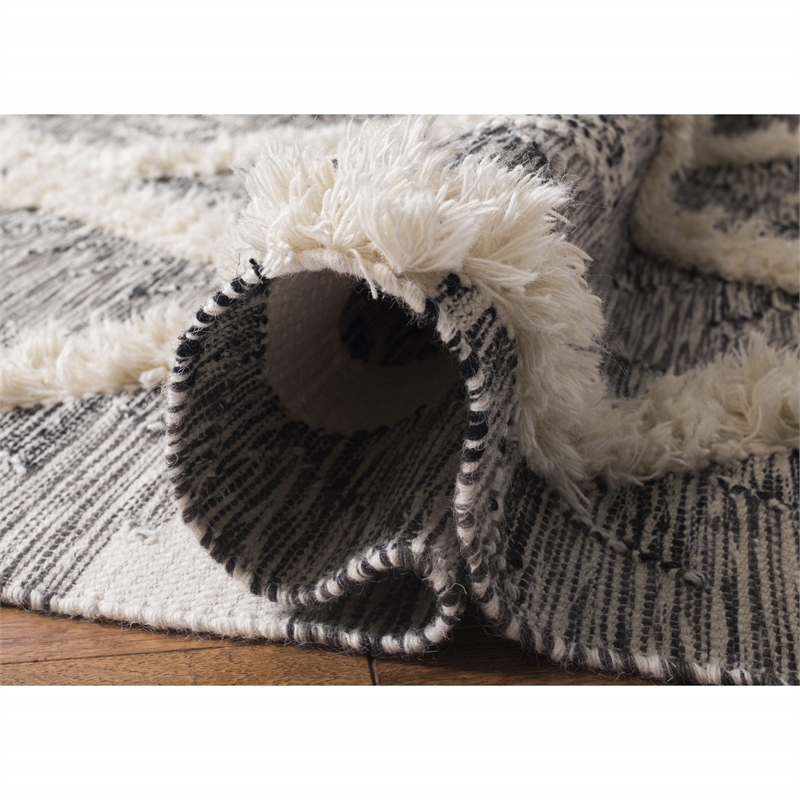 Safavieh Kenya 8' x 10' Hand Woven Shag Wool Rug in Black and Ivory