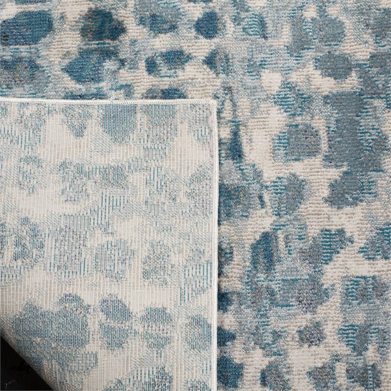 Safavieh Aria 4' x 6' Rug in Ivory and Teal