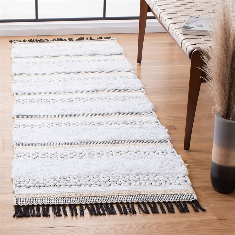 Safavieh Boston 8' x 10' Hand Tufted Rug in Ivory and Beige
