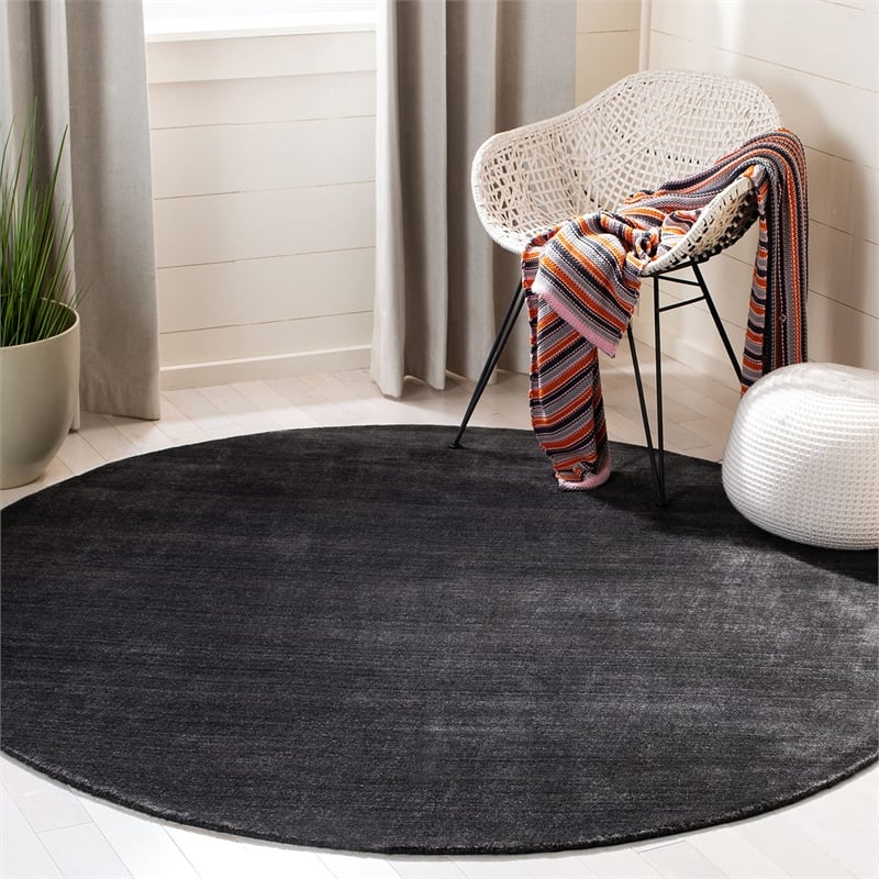 Safavieh Himalaya 6' Round Hand Tufted Wool Rug in Black