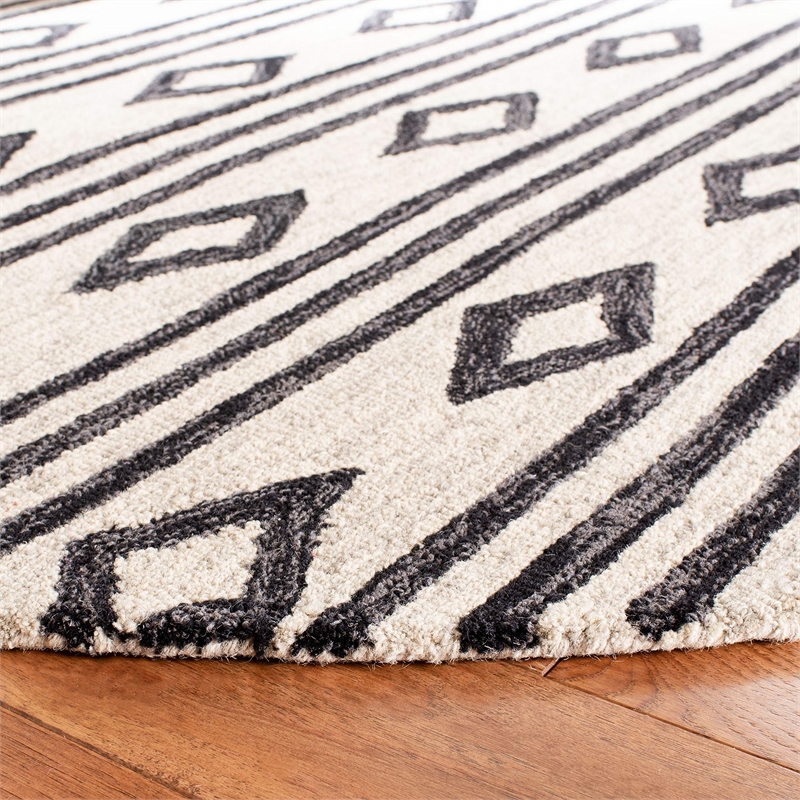 Safavieh Micro-Loop 8' x 10' Hand Tufted Wool Rug in Ivory
