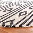 Safavieh Micro-Loop 8' x 10' Hand Tufted Wool Rug in Ivory