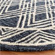 Safavieh Micro-Loop 5' Round Hand Tufted Wool Rug in Navy and Ivory