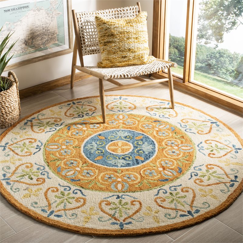 Safavieh Novelty 5' Round Hand Tufted Wool Rug in Gold and Ivory