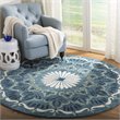 Safavieh Novelty 4' Round Hand Tufted Wool Rug in Blue and Ivory