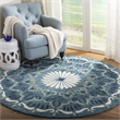 Safavieh Novelty 6' Round Hand Tufted Wool Rug in Blue and Ivory