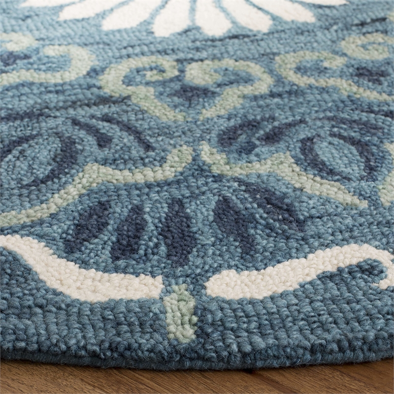 Safavieh Novelty 6' Round Hand Tufted Wool Rug in Blue and Ivory