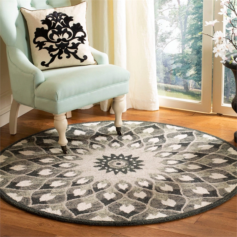 Safavieh Novelty 4' Round Hand Tufted Wool Rug in Rust and Gold