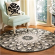Safavieh Novelty 4' Round Hand Tufted Wool Rug in Rust and Gold