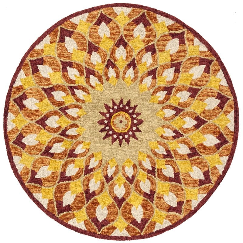 Safavieh Novelty 6' Round Hand Tufted Wool Rug in Rust and Gold