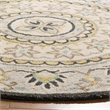 Safavieh Novelty 4' Round Hand Tufted Wool Rug in Gray and Black