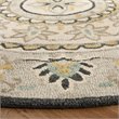 Safavieh Novelty 6' Round Hand Tufted Wool Rug in Gray and Black
