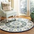 Safavieh Novelty 4' Round Hand Tufted Wool Rug in Ivory and Blue