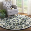 Safavieh Novelty 6' Round Hand Tufted Wool Rug in Ivory and Blue