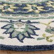 Safavieh Novelty 6' Round Hand Tufted Wool Rug in Ivory and Blue
