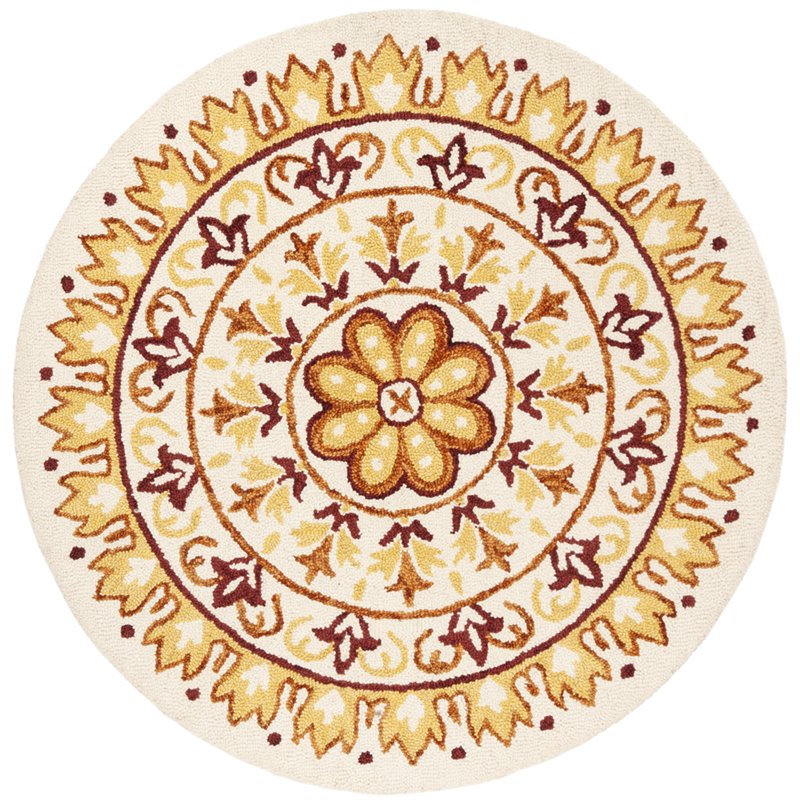 Safavieh Novelty 6' Round Hand Tufted Wool Rug in Gold and Ivory