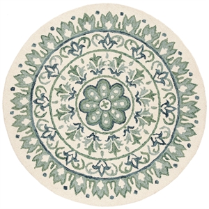 Safavieh Novelty 4' Round Hand Tufted Wool Rug in Ivory and Teal