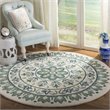 Safavieh Novelty 6' Round Hand Tufted Wool Rug in Ivory and Teal
