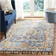 Safavieh Aspen 8' x 10' Hand Tufted Wool Rug in Blue and Rust