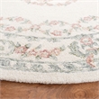 Safavieh Aubusson 6' Round Hand Tufted Wool Rug in Ivory and Pink