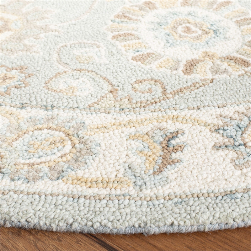 Safavieh Blossom 6' Round Hand Tufted Wool Rug in Aqua and Ivory