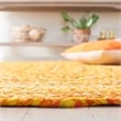 Safavieh Braided 4' Round Hand Woven Rug in Gold