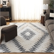 Safavieh Kenya 6' x 9' Hand Woven Shag Wool Rug in Black and Ivory