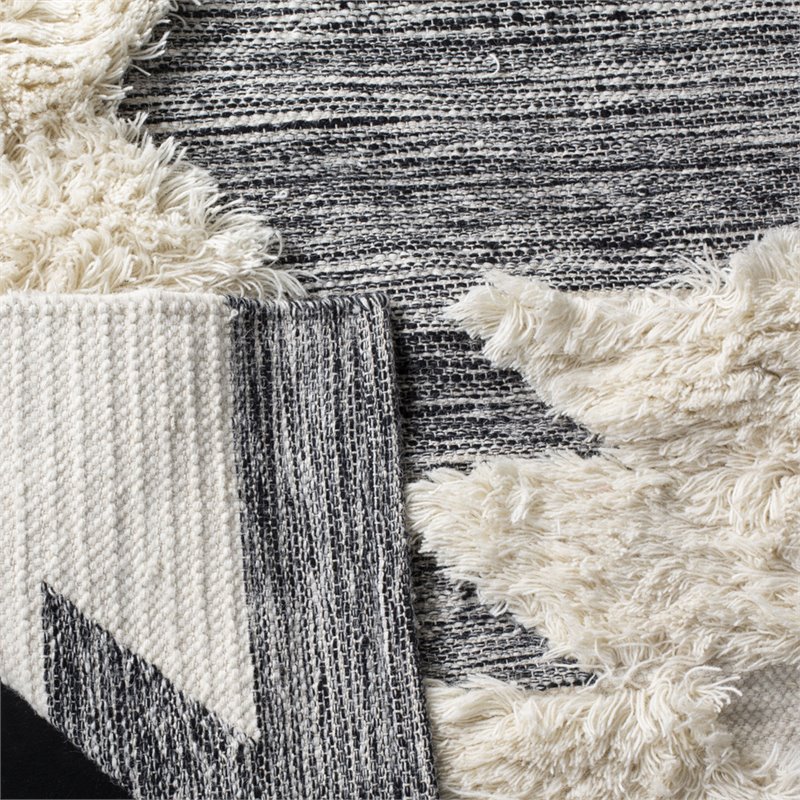 Safavieh Kenya 6' x 9' Hand Woven Shag Wool Rug in Black and Ivory