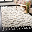 Safavieh Kenya 6' x 9' Hand Knotted Shag Wool Rug in Gray and Ivory