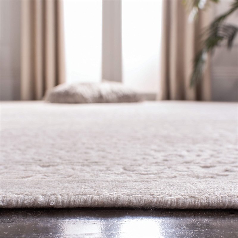 Safavieh Mirage 9' x 12' Hand Loomed Rug in Ivory