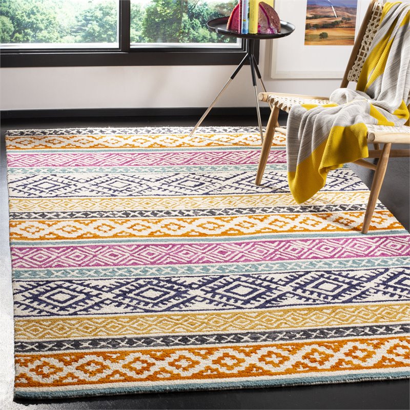 Safavieh Micro-Loop 8' x 10' Hand Tufted Wool Rug in Ivory and Rust