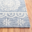 Safavieh Micro-Loop 4' x 6' Hand Tufted Wool Rug in Blue and Ivory