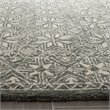 Safavieh Micro-Loop 4' x 6' Hand Tufted Wool Rug in Blue and Ivory