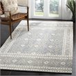 Safavieh Micro-Loop 5' x 8' Hand Tufted Wool Rug in Blue and Ivory